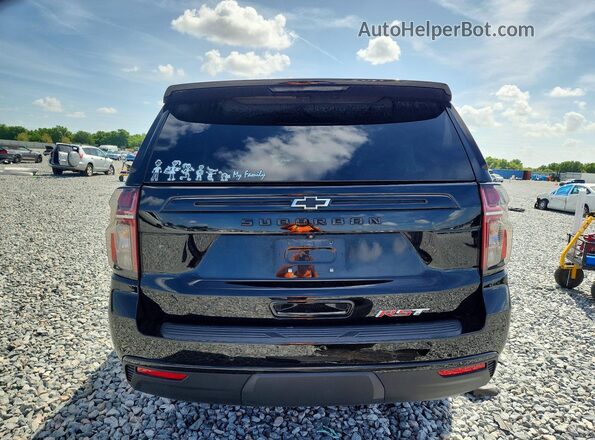 1GNSCEKD4PR343579 2023 CHEVROLET SUBURBAN Black Вид ззаду