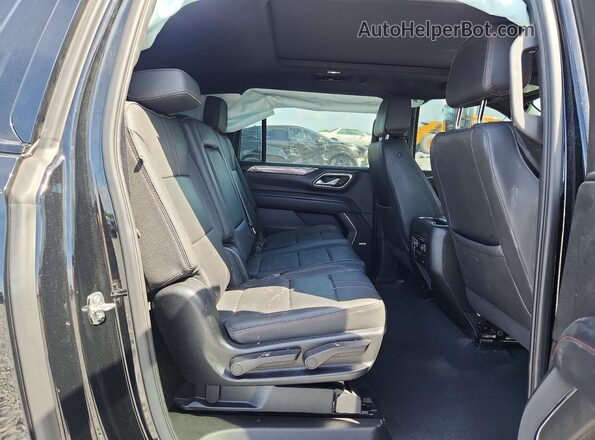 1GNSCEKD4PR343579 2023 CHEVROLET SUBURBAN Black Вид задньої частини салону