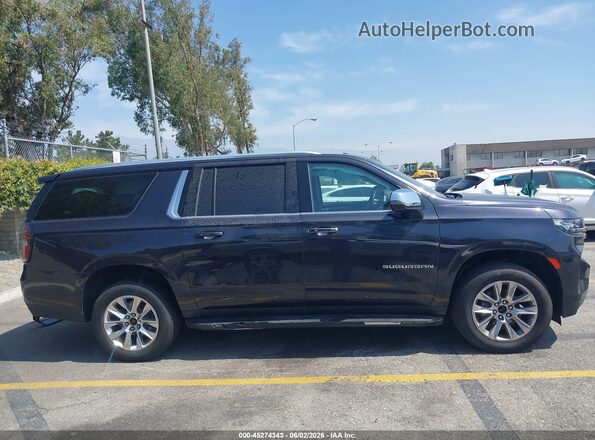 1GNSCFKD4PR135207 2023 CHEVROLET SUBURBAN Black უკანა სალონის ხედი