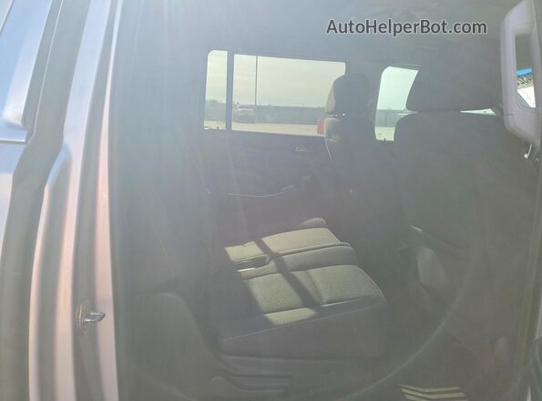 1GNSCGEC7GR200365 2016 CHEVROLET SUBURBAN Silver Vista de los asientos traseros
