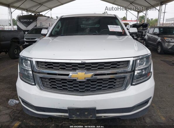 1GNSCGEC8HR311265 2017 CHEVROLET SUBURBAN White Widok wnętrza z tyłu