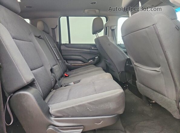 1GNSCGKC7JR352352 2018 CHEVROLET SUBURBAN Gray Vista interior trasera