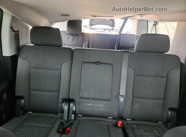1GNSCGKC7JR352352 2018 CHEVROLET SUBURBAN Gray Vista de los asientos traseros