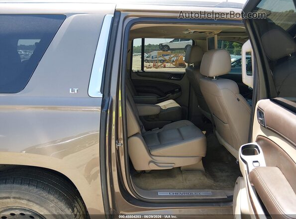 1GNSCHKC0GR125499 2016 CHEVROLET SUBURBAN Brown Вид наклейки з VIN-кодом