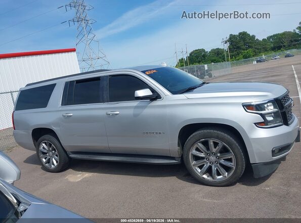 1GNSCHKC7GR364709 2016 CHEVROLET SUBURBAN Silver Widok wnętrza z tyłu