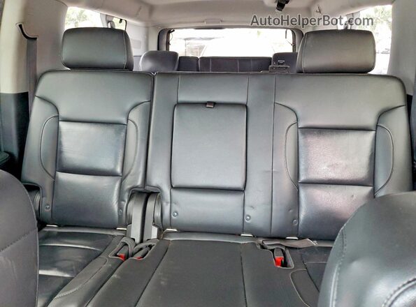 1GNSCHKC8JR233912 2018 CHEVROLET SUBURBAN Black Vista de los asientos traseros