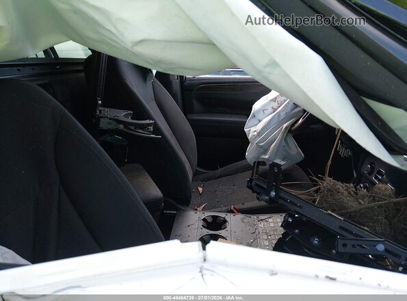 1GNSCLED4PR171781 2023 CHEVROLET TAHOE Черный Вид салона спереди