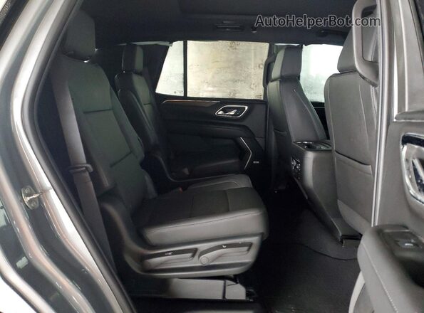 1GNSCNKD0PR513808 2023 CHEVROLET TAHOE Gray Rear interior view