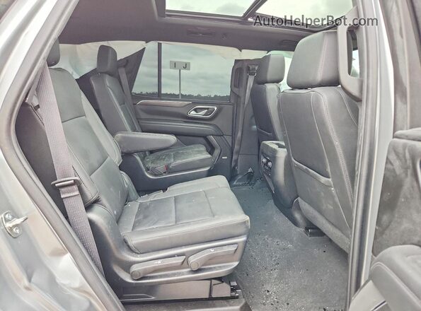 1GNSCNKD5PR470261 2023 CHEVROLET TAHOE Gray Rear interior view