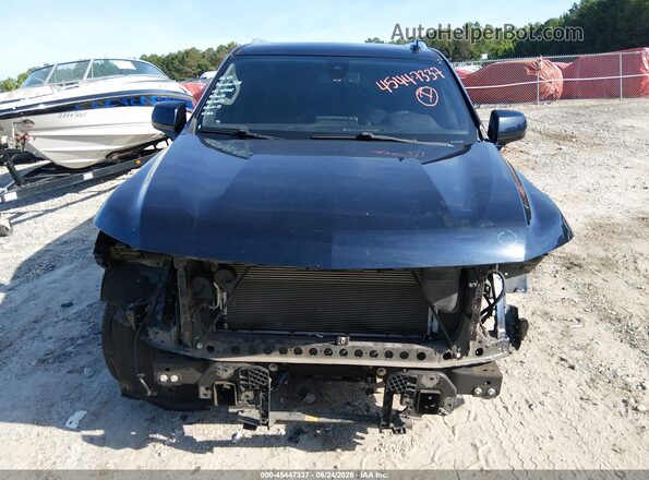 1GNSCNKD7NR283858 2022 CHEVROLET TAHOE Dark Blue Вид задней части салона
