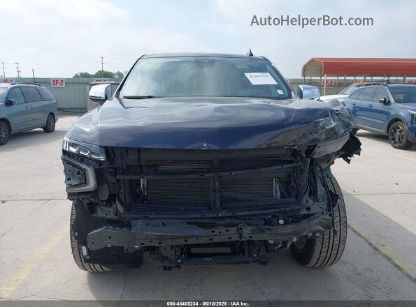 1GNSCSKD5RR194245 2024 CHEVROLET TAHOE Black Սալոնի հետևի տեսք