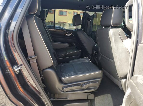 1GNSCSKDXRR221584 2024 CHEVROLET TAHOE Серый Вид задней части салона