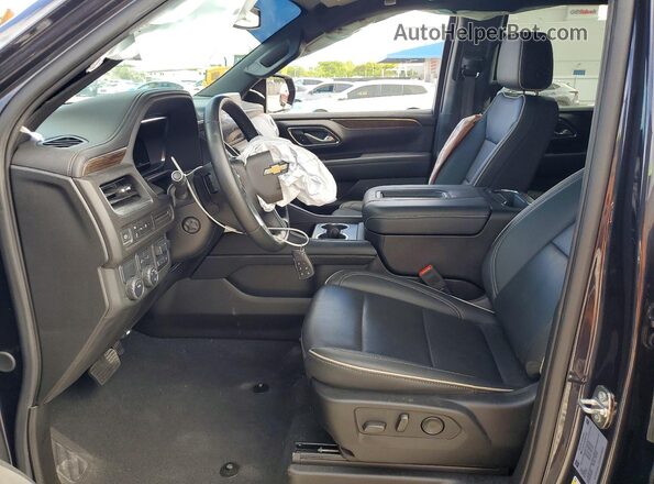 1GNSCSKDXRR221584 2024 CHEVROLET TAHOE Серый Вид салона спереди