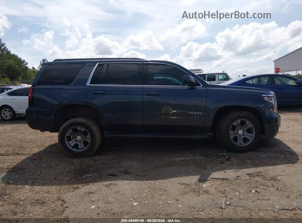 1GNSKAEC5KR332100 2019 CHEVROLET TAHOE Blue Vista interior trasera