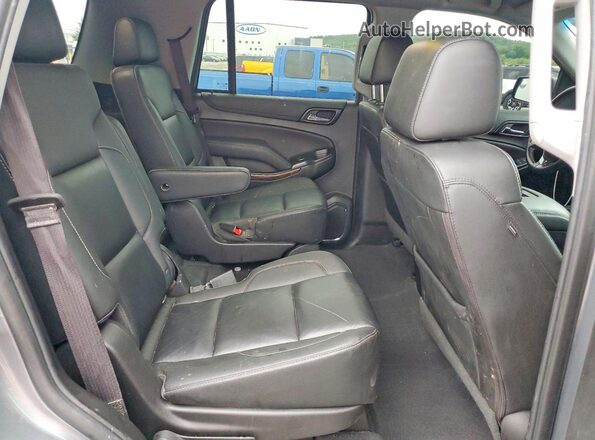 1GNSKBKC2KR106199 2019 CHEVROLET TAHOE Gray უკანა სალონის ხედი