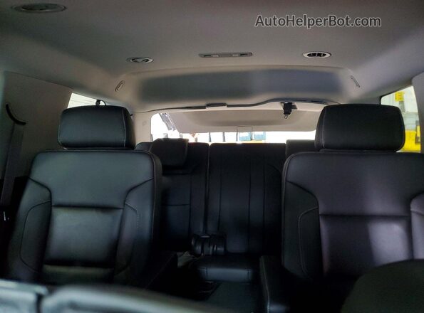 1GNSKBKC4HR110974 2017 CHEVROLET TAHOE Gray Հետևի նստատեղերի տեսք