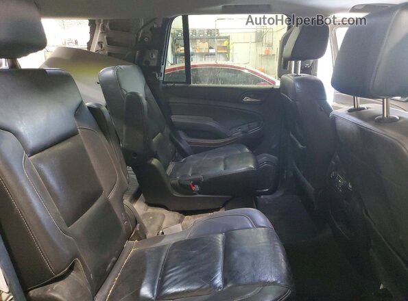 1GNSKBKC4JR141289 2018 CHEVROLET TAHOE Silver Widok wnętrza z tyłu