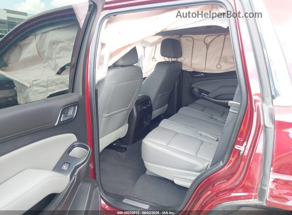 1GNSKBKC4KR273129 2019 CHEVROLET TAHOE Red VIN կոդի պիտակի տեսք