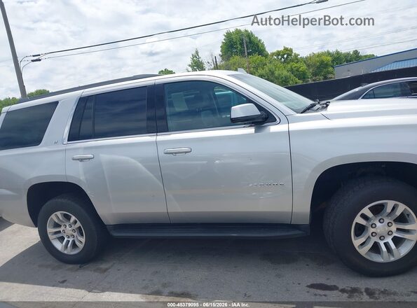 1GNSKBKC6KR403752 2019 CHEVROLET TAHOE Silver Widok wnętrza z tyłu