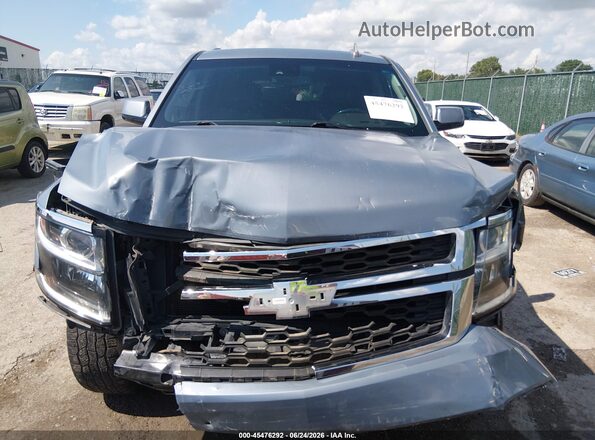 1GNSKBKC7GR332651 2016 CHEVROLET TAHOE Gray უკანა სალონის ხედი