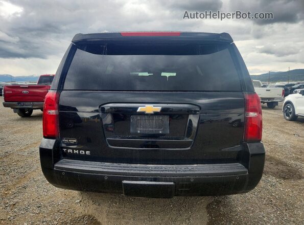 1GNSKBKC7LR243026 2020 CHEVROLET TAHOE Black Rear view