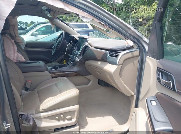 1GNSKBKC8KR333798 2019 CHEVROLET TAHOE Gray Widok wnętrza z przodu