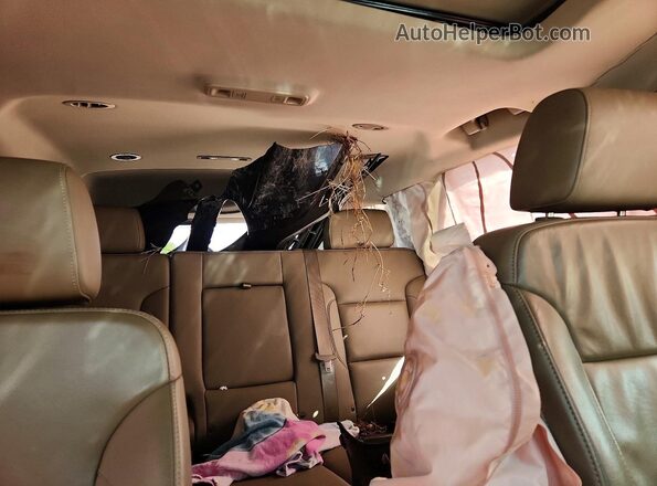 1GNSKBKC9GR284120 2016 CHEVROLET TAHOE Burgundy Вид задніх сидінь