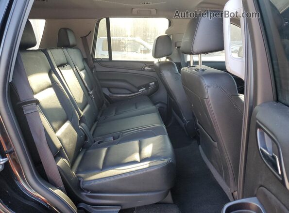 1GNSKBKC9JR326552 2018 CHEVROLET TAHOE Black Widok wnętrza z tyłu