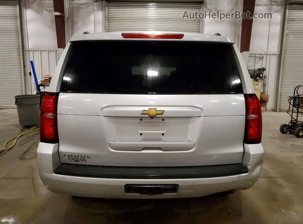 1GNSKBKCXGR181935 2016 CHEVROLET TAHOE Серебряный Вид сзади
