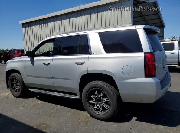 1GNSKBKCXKR177280 2019 CHEVROLET TAHOE Silver უკანა მარცხენა
