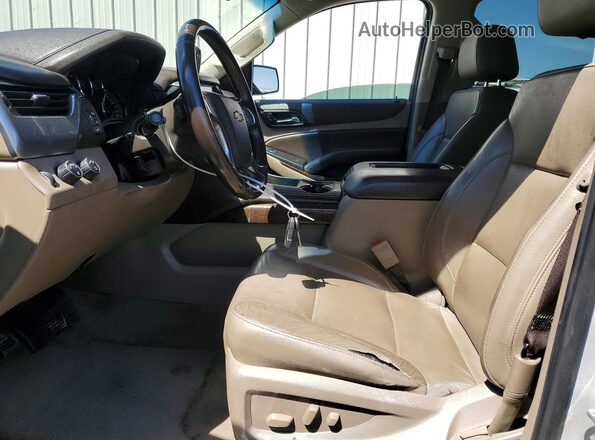 1GNSKBKCXKR177280 2019 CHEVROLET TAHOE Silver წინა სალონის ხედი