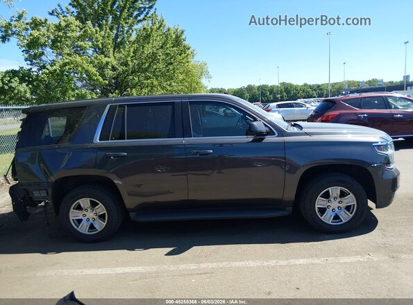 1GNSKDKC4JR173719 2018 CHEVROLET TAHOE Black Widok wnętrza z tyłu