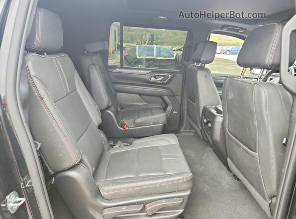 1GNSKEKDXPR382423 2023 CHEVROLET SUBURBAN Black Вид задньої частини салону