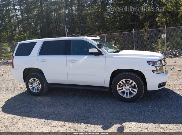 1GNSKFEC3LR112615 2020 CHEVROLET TAHOE White Widok wnętrza z tyłu