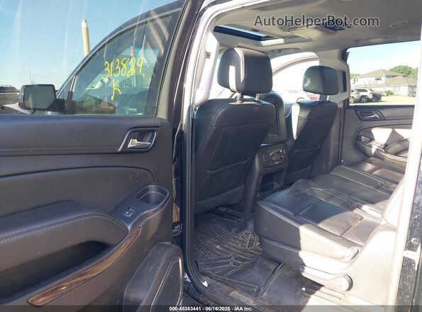 1GNSKHKC0GR313829 2016 CHEVROLET SUBURBAN Black VIN კოდის სტიკერის ხედი