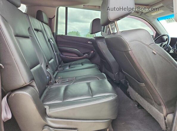 1GNSKHKC0LR238866 2020 CHEVROLET SUBURBAN Silver Vista interior trasera