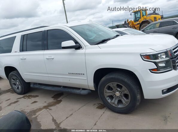 1GNSKHKC1LR304566 2020 CHEVROLET SUBURBAN White Widok wnętrza z tyłu