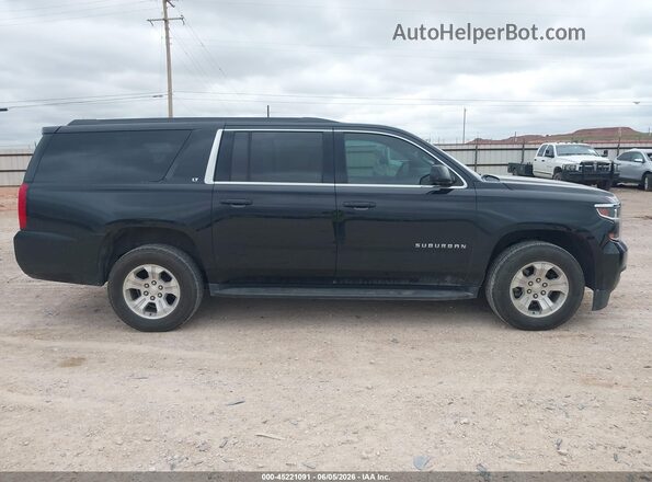 1GNSKHKC2JR379404 2018 CHEVROLET SUBURBAN Black Rear interior view