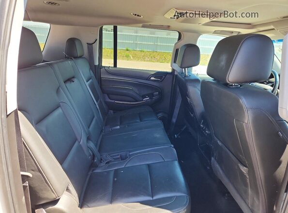 1GNSKHKC3JR227549 2018 CHEVROLET SUBURBAN White Widok tylnych siedzeń