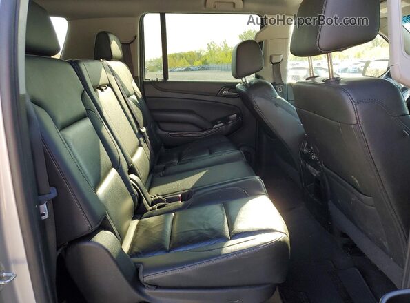1GNSKHKC8LR101562 2020 CHEVROLET SUBURBAN Silver Vista interior trasera