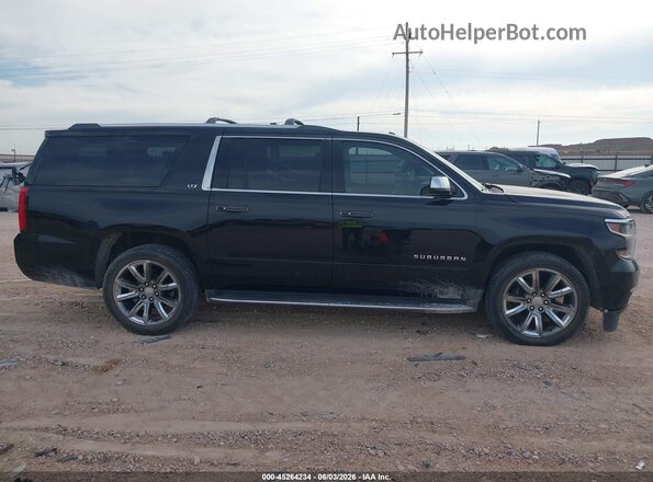 1GNSKJKC8GR165811 2016 CHEVROLET SUBURBAN Black Widok wnętrza z tyłu