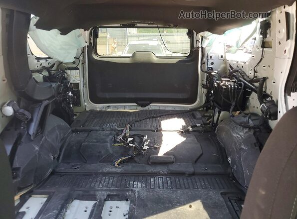 1GNSKLED6RR188815 2024 CHEVROLET TAHOE White Vista de los asientos traseros