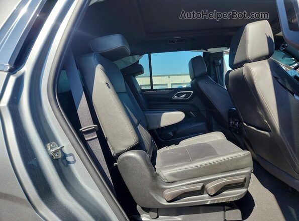1GNSKNKD4RR347136 2024 CHEVROLET TAHOE Silver Vista interior trasera