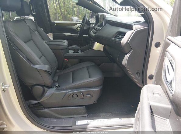 1GNSKPKD5PR428025 2023 CHEVROLET TAHOE Tan Вид салону спереду