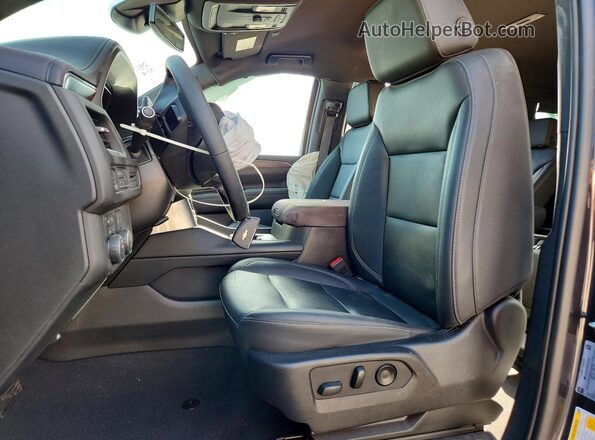 1GNSKPKD6PR228299 2023 CHEVROLET TAHOE Черный Вид салона спереди