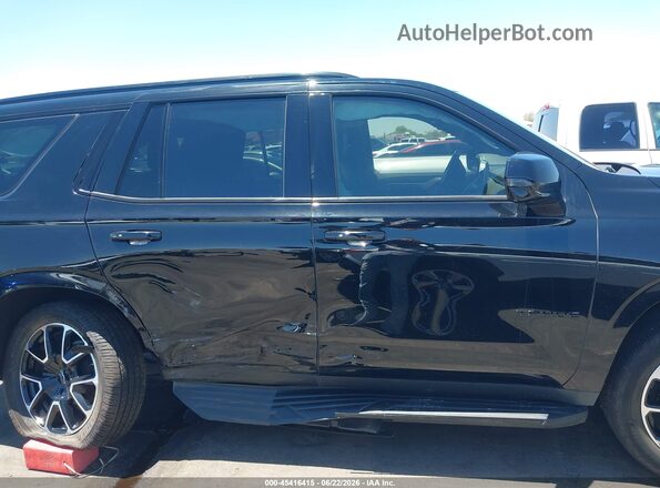 1GNSKRKD8PR313642 2023 CHEVROLET TAHOE Black Вид задньої частини салону