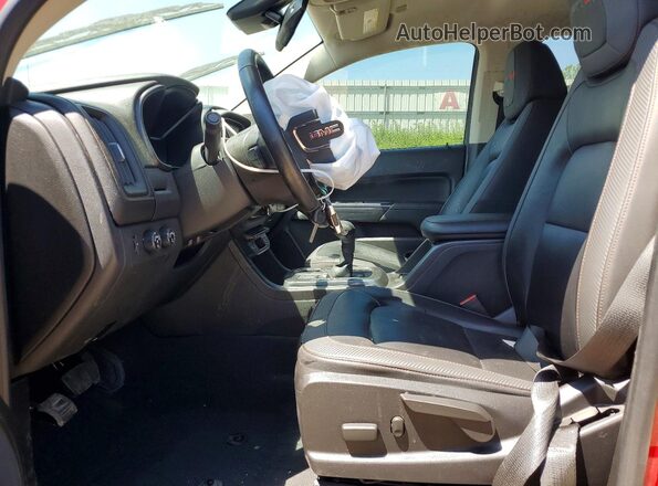 1GTG6FENXM1150265 2021 GMC CANYON Red Widok wnętrza z przodu