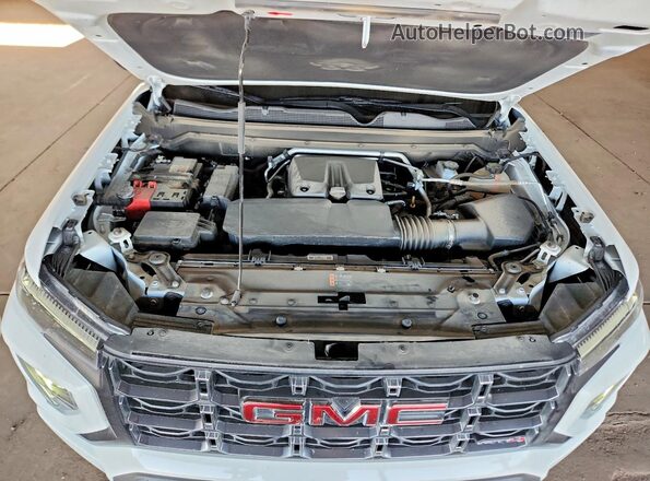 1GTP2DEK7S1113998 2025 GMC CANYON White Սալոնի հետևի տեսք