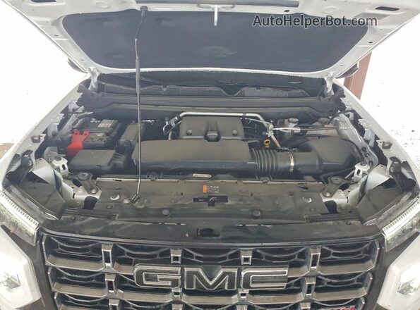 1GTP2DEK7S1117226 2025 GMC CANYON White Widok wnętrza z tyłu