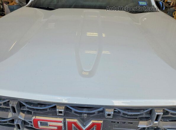1GTP2DEK7T1155086 2026 GMC CANYON White Widok wnętrza z tyłu
